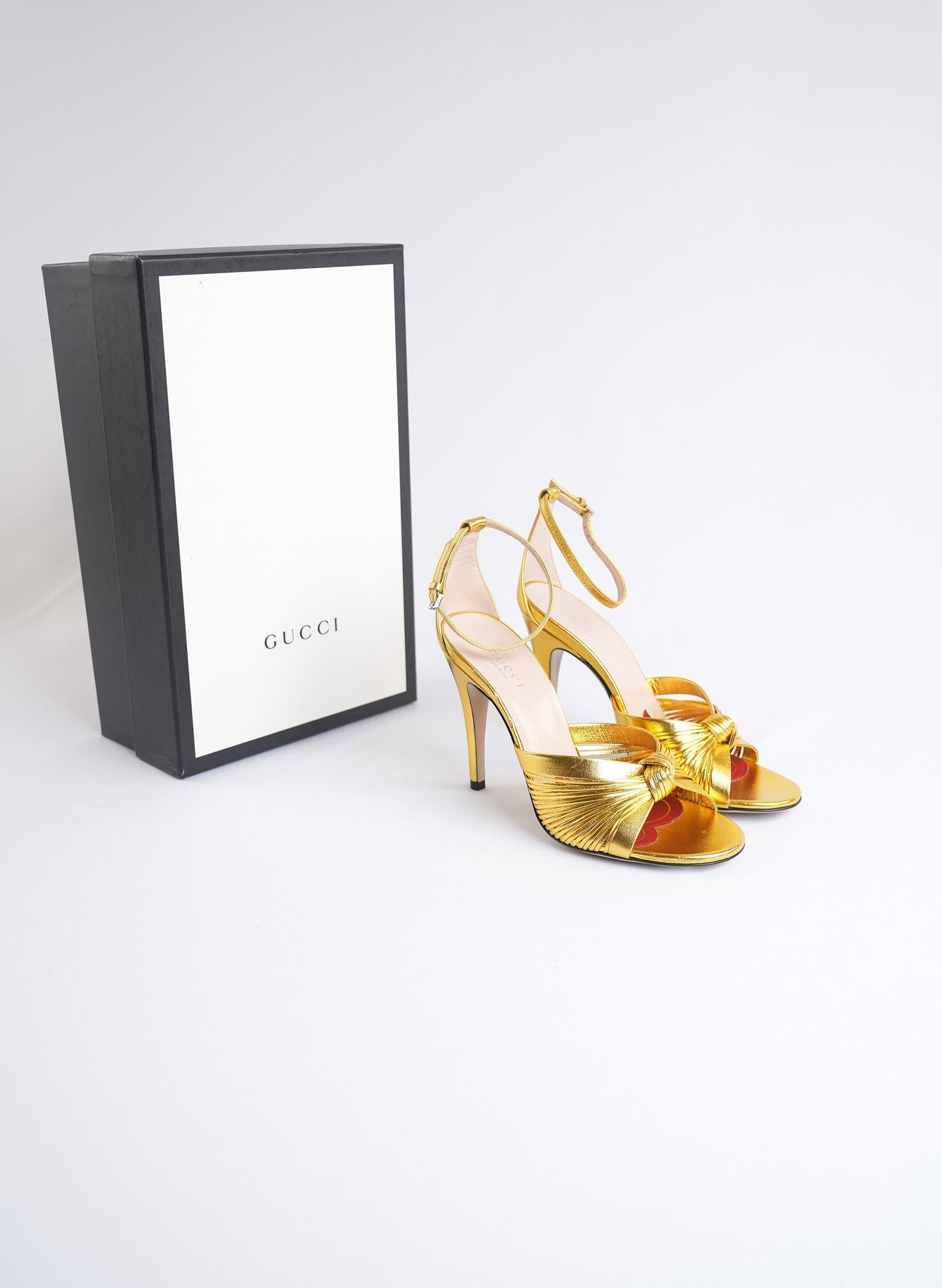 Gucci Metallic Nappa Crawford Knot Ankle Strap Heels