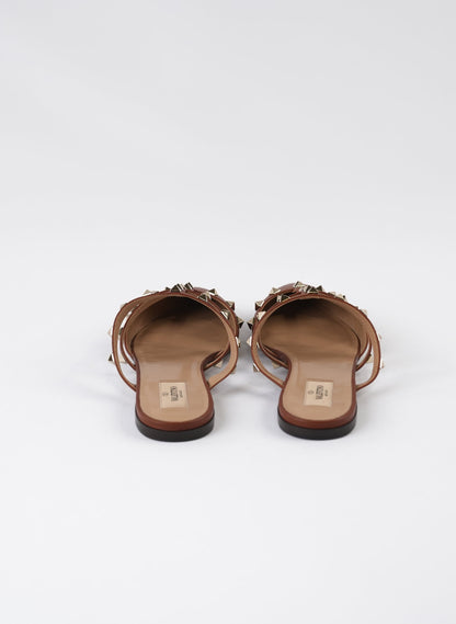 Valentino Garavani Pebbled Calfskin Rockstud Flat Cage Mules